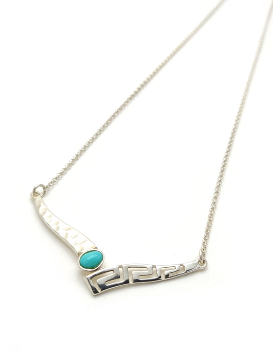 Silver Necklace with the Greek Key and a turquoise stone on white background.