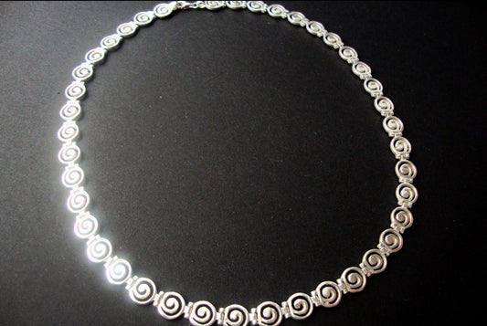 Greek silver spiral necklaces , the infinity design.