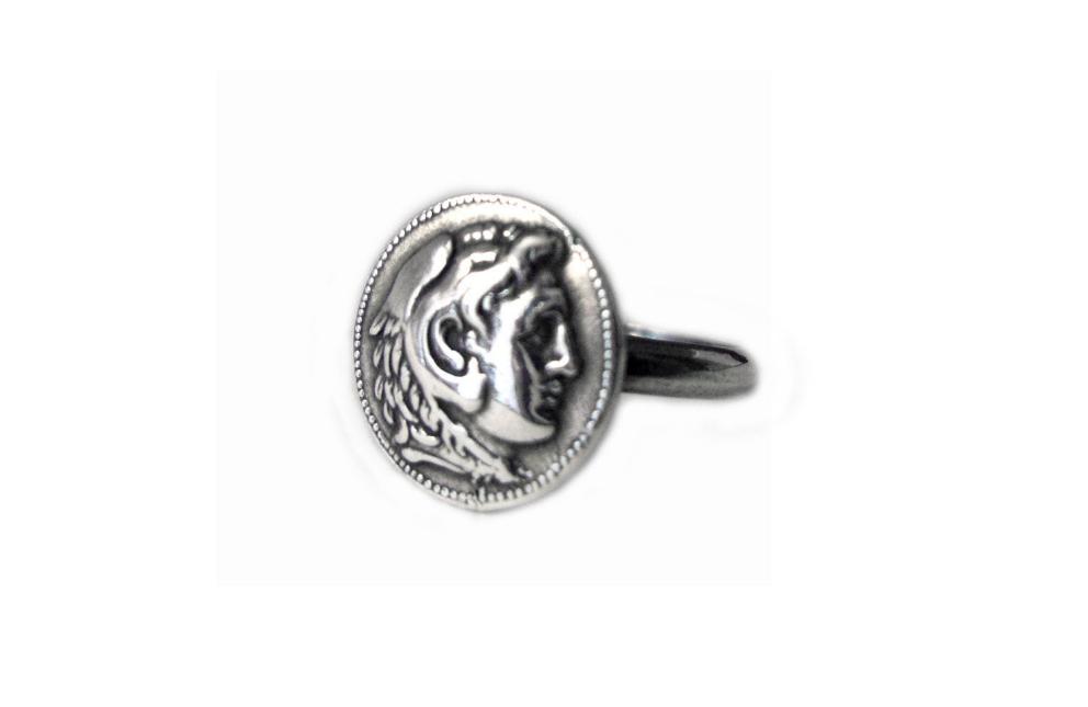 Silver Greek ring with a coin of Alexander The Great made of silver 925 on white background.
