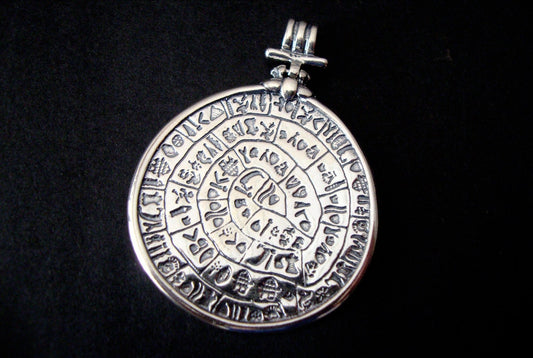Greek silver pendant that depicts the Phaistos Disc from Crete made of solid Sterling Silver 925.